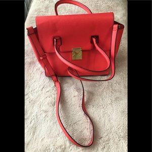 Women’s satchel purse with gold lock